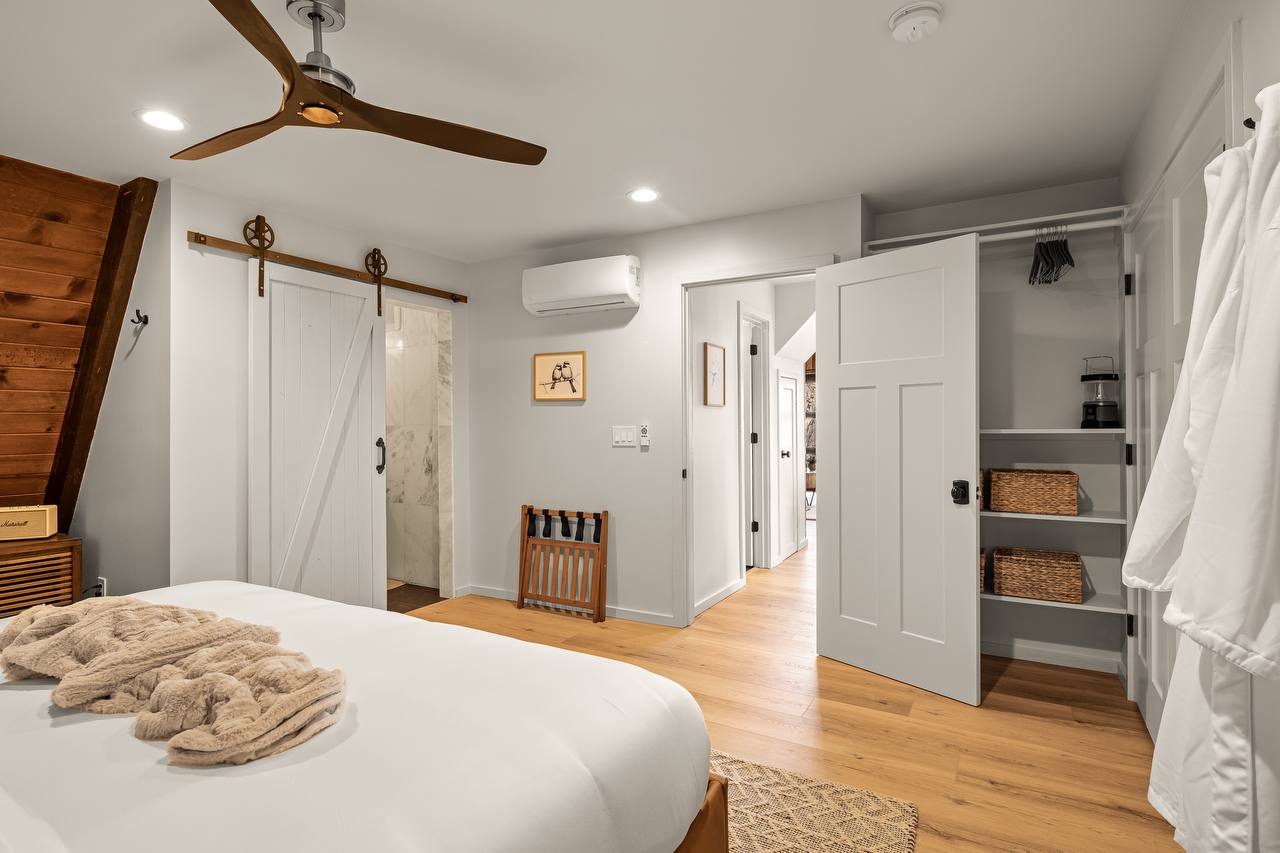 Second bedroom with barn door to bathroom