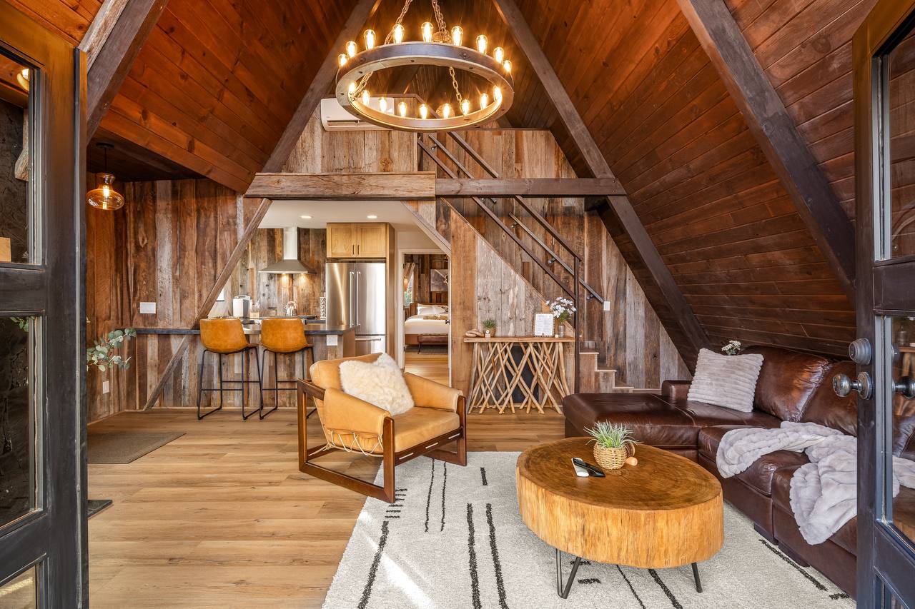 Great room with chandelier and open floor plan