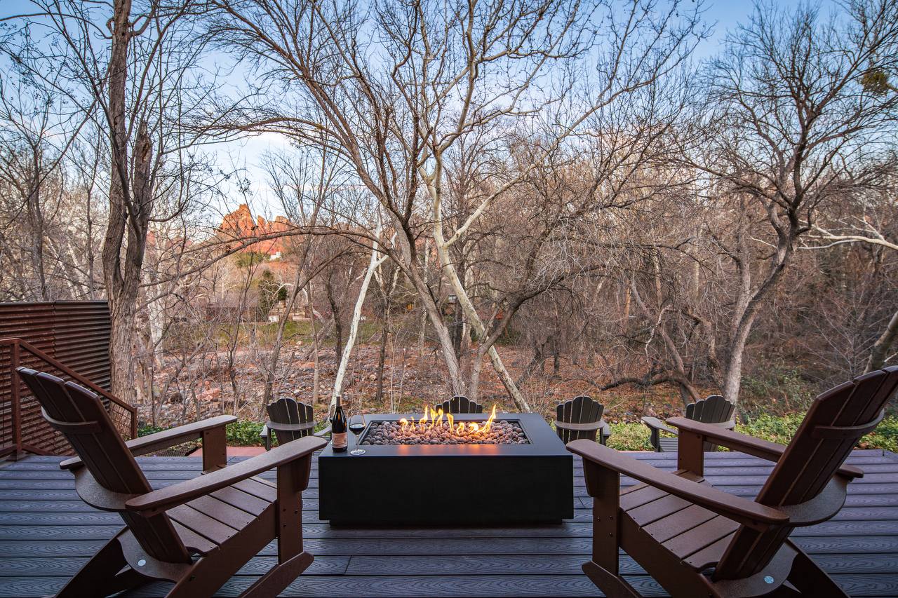Fire feature deck during daytime with red rocks