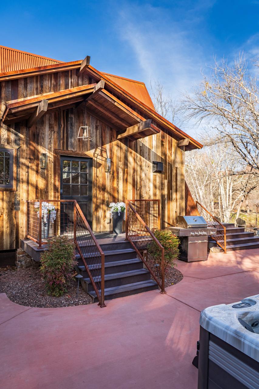 Exterior with BBQ grill and hot tub